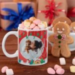 Custom dog photo coffee cup featuring a photo of a dog and pet owner in a Christmas setting.