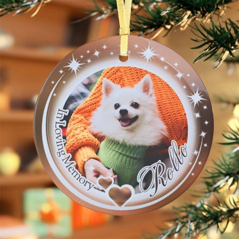 Close-up view of a brown personalized dog memorial ornament.