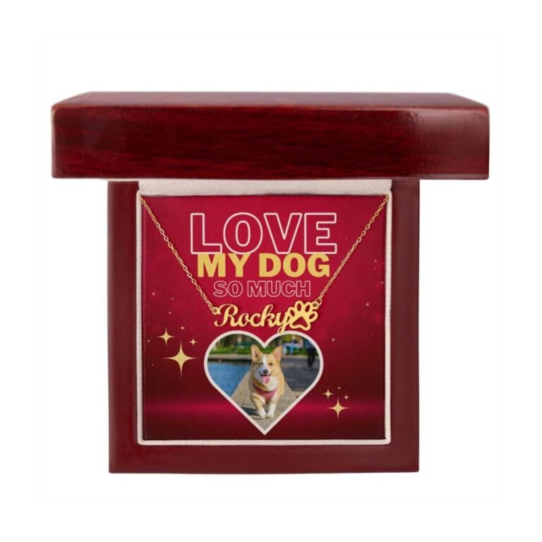 Gold-finish dog name and paw print necklace with dog photo, set against a red background, elegantly displayed in a luxury gift box