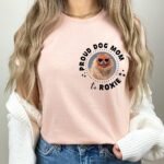 Custom gift t-shirt for a new dog owner in heather prism peach color, featuring a personalized design celebrating their new furry friend