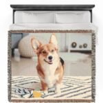 Personalized woven pet photo blanket featuring a dog's portrait in warm tones, showcasing a cozy and heartfelt keepsake perfect for pet lovers.